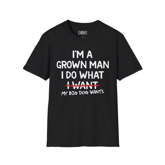 Black t-shirt with white text I'm a grown man—I do what my big dog wants,” with “I want” crossed out.