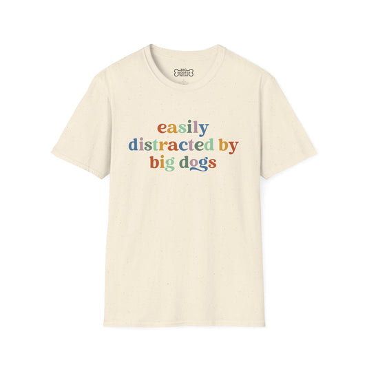 Natural color t-shirt with text: Easily distracted by big dogs in bold letters, each letter rendered in a different color.