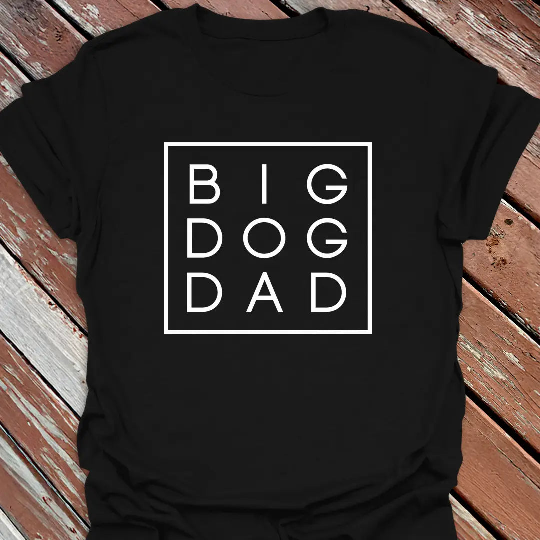 Big Woofer Wear black “Big Dog Dad” T-shirt for large breed dads, boxed text design on wood background
