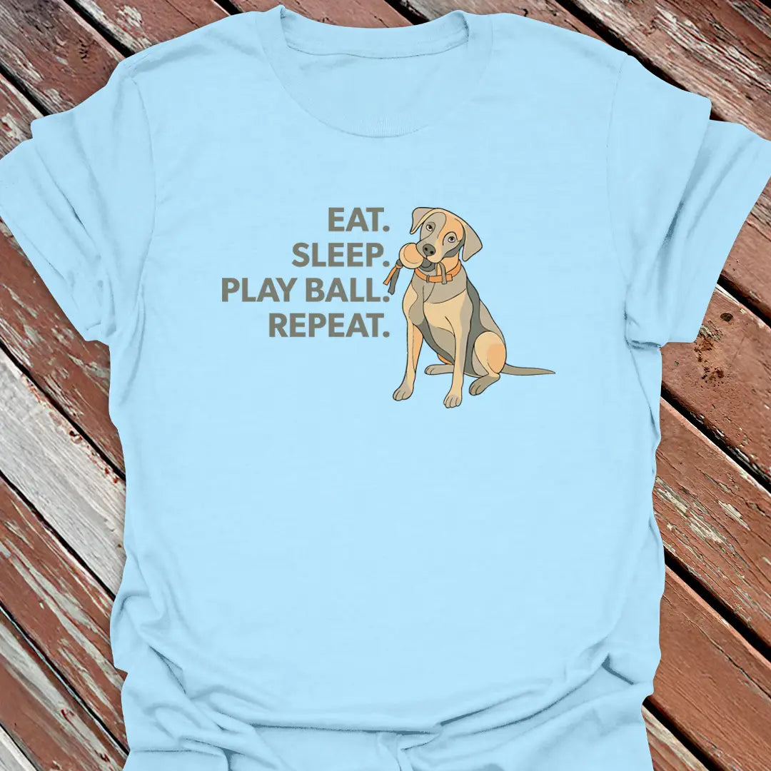 Big Woofer Wear light blue “Eat Sleep Play Ball Repeat” Labrador tee for big dog lovers, sporty design on wood background