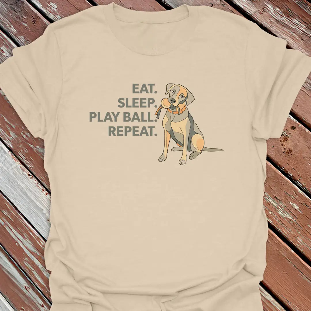 Big Woofer Wear sand “Eat Sleep Play Ball Repeat” Labrador tee for big dog lovers, sporty design on wood background